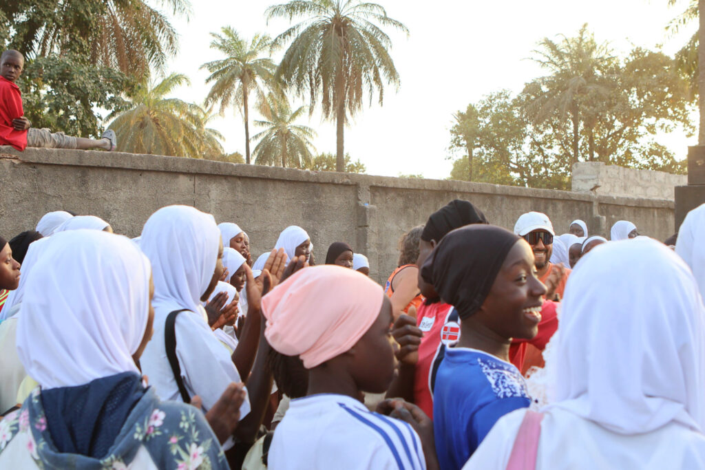 Children at The beachvolleybal court at Jamisa School Brikama, The Gambia - Lisette dancing